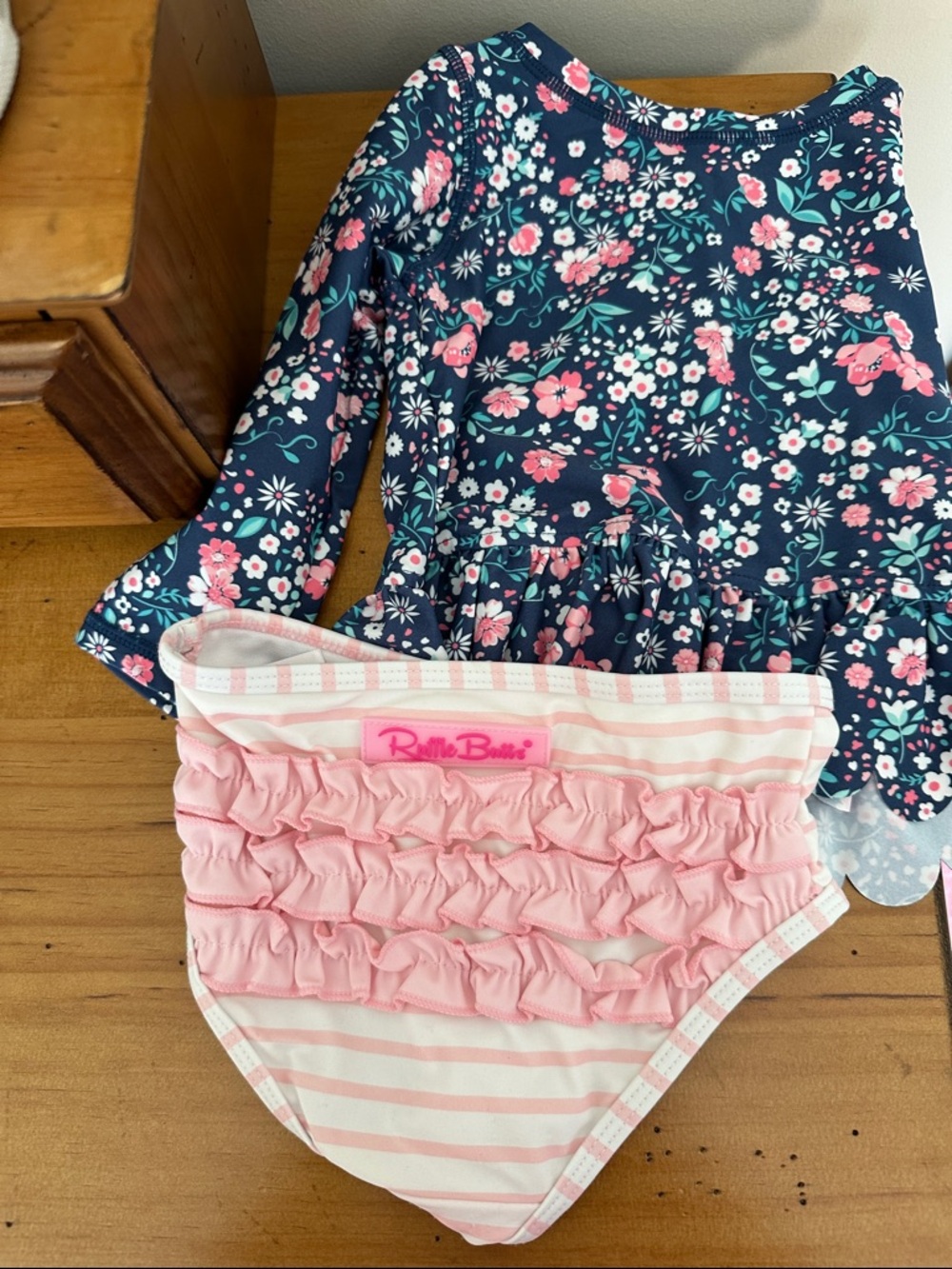 Ruffle Butts Navy Floral Rashguard with Pink Ruffle Stripe Bottoms